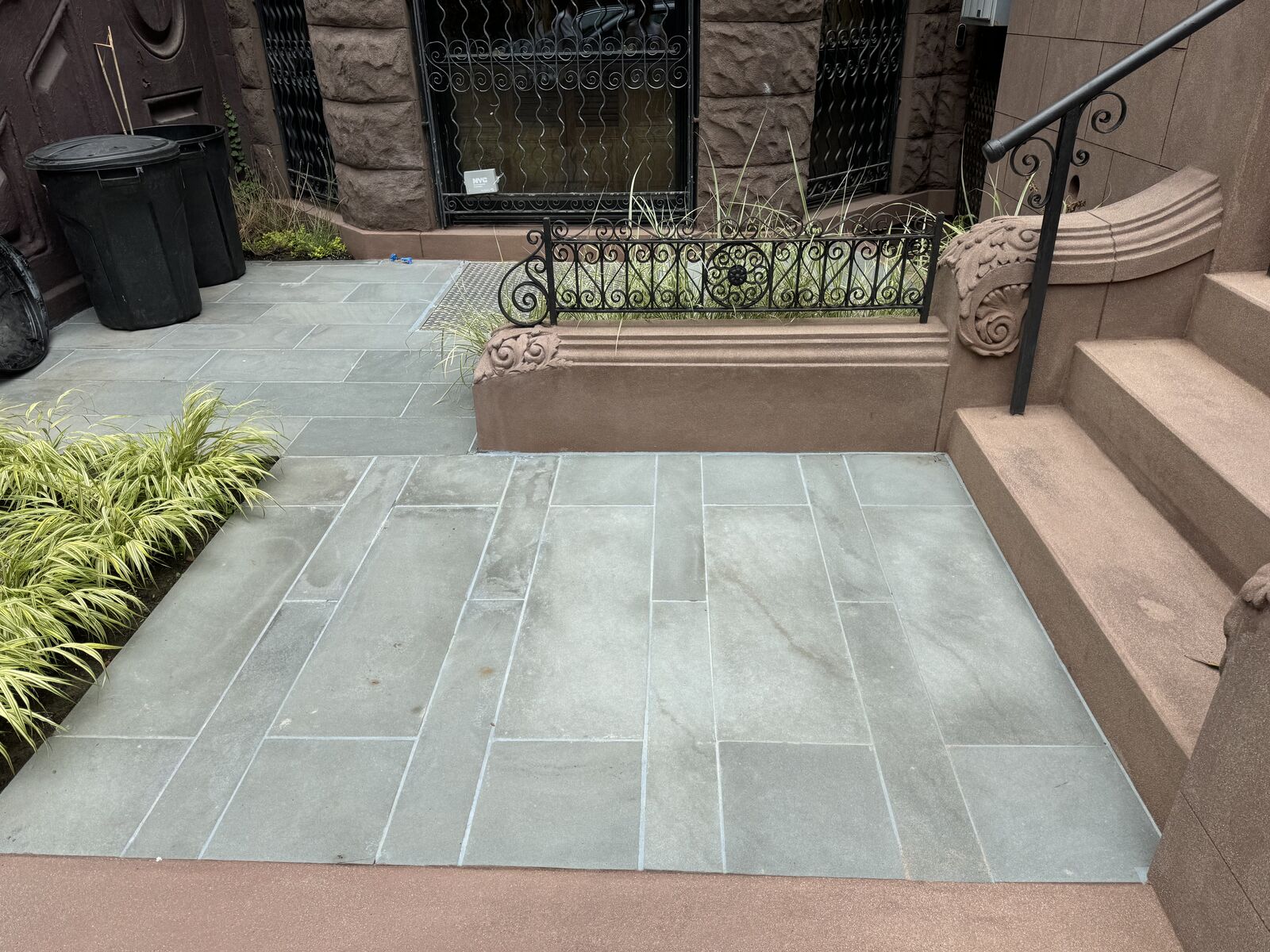 Finished bluestone patio and planting bed