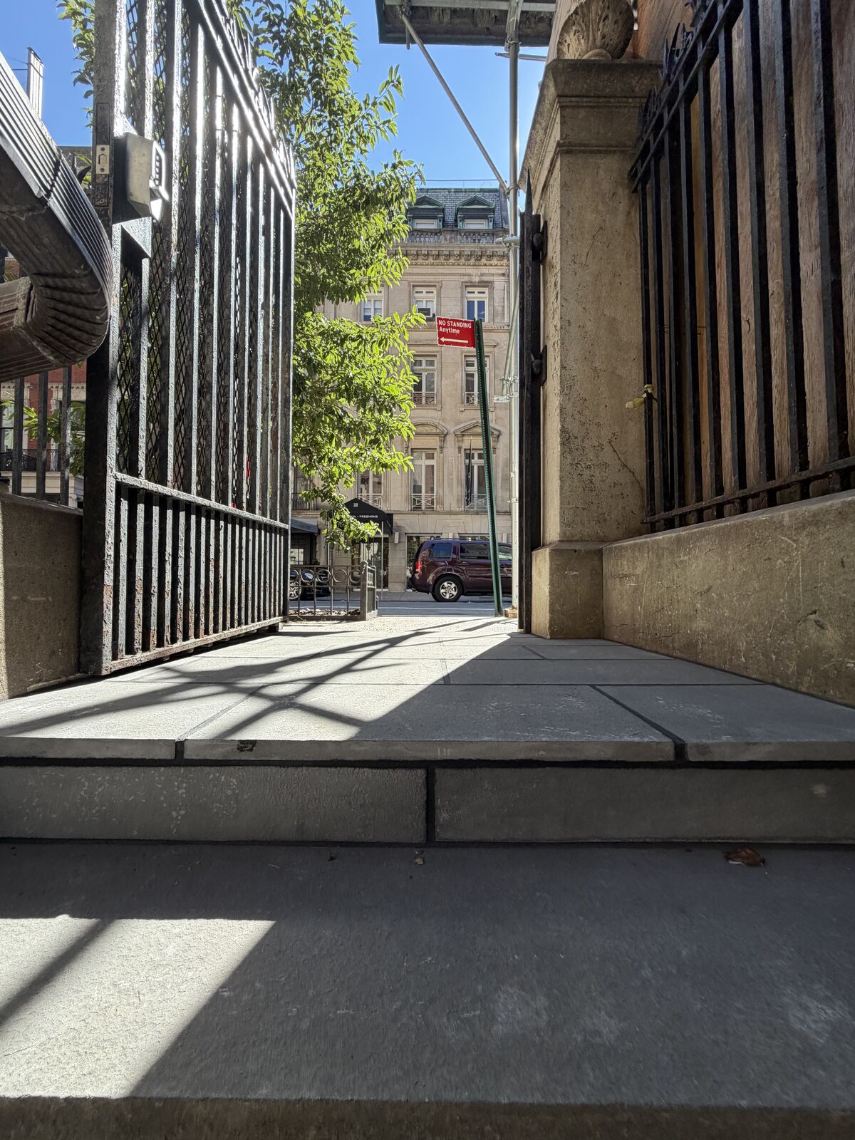 New bluestone paving laid to fall