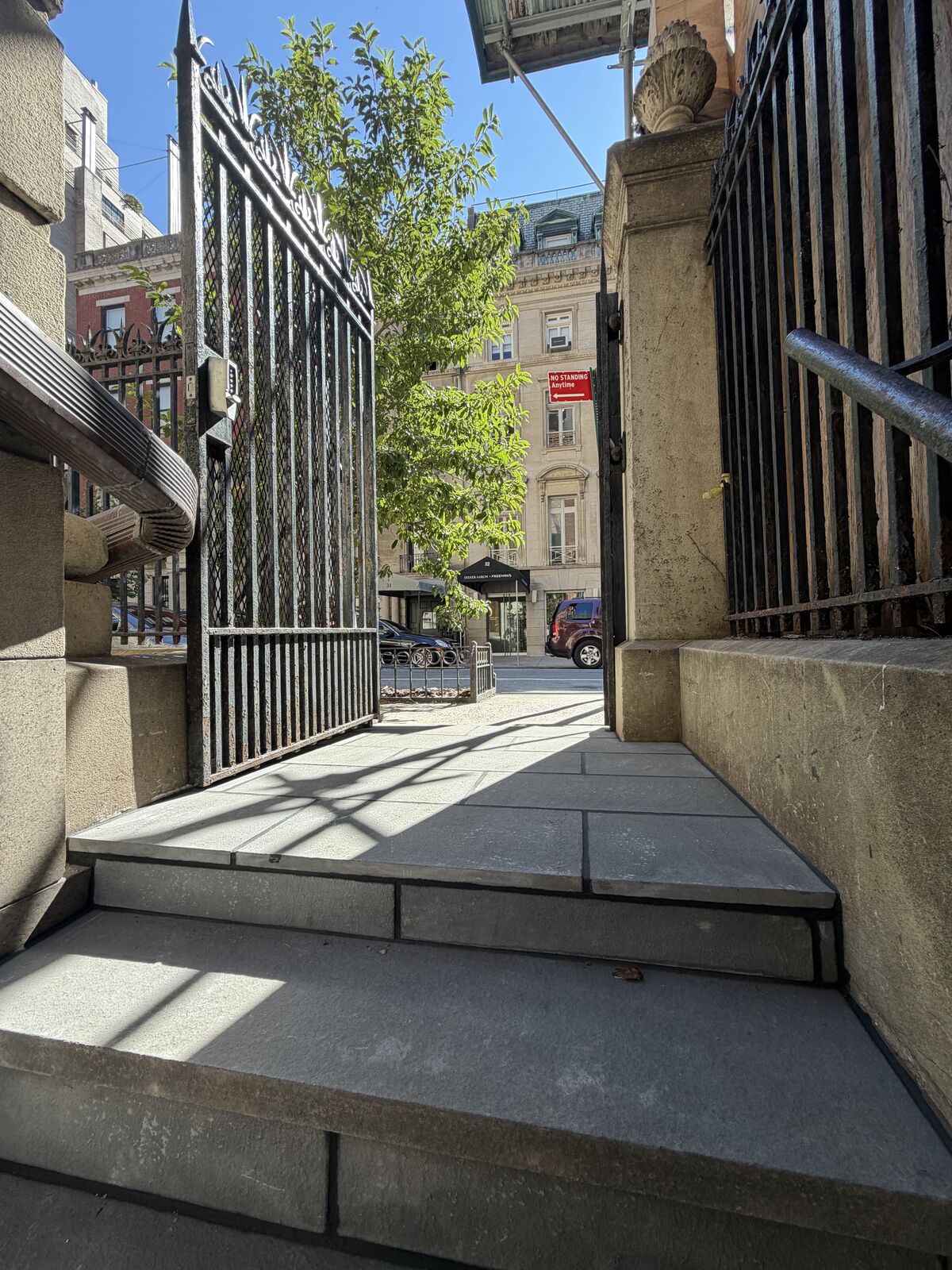 Repaved entry court at the street gate