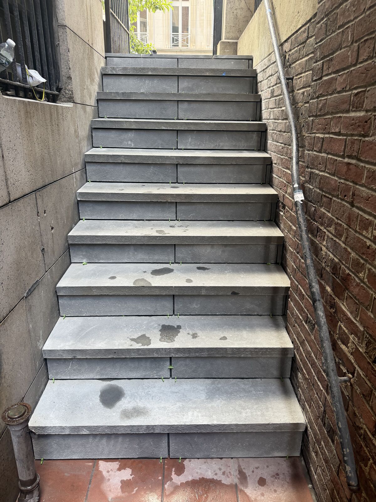Service stair rebuilt in bluestone